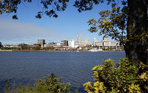 City of Peoria Illinois downtown skyline and trees on the The Illinois River